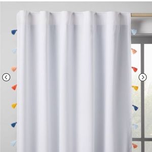 White blackout curtains with colorful tassels (2)